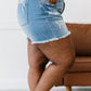 SneakPeek Sloane Faded Raw Hem Shorts -