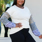 Heimish Full Size Animal Print Ruffle Trim Top -