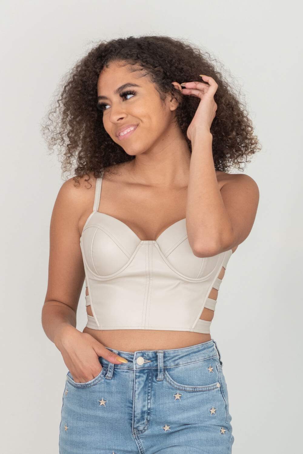 SHOPIRISBASIC Ready to Go Faux Leather Strappy Bustier Crop Top in Oyster -