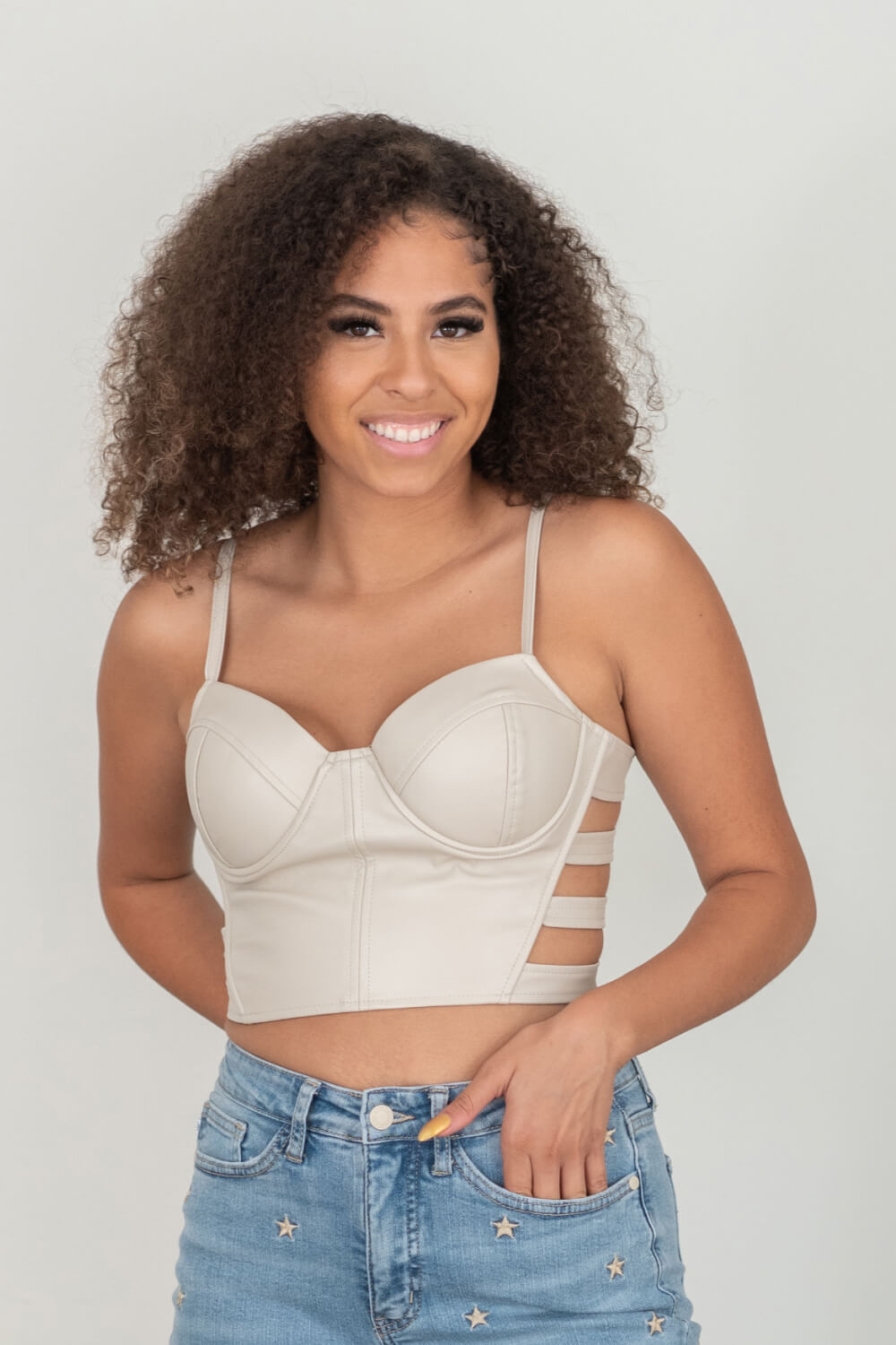 SHOPIRISBASIC Ready to Go Faux Leather Strappy Bustier Crop Top in Oyster -