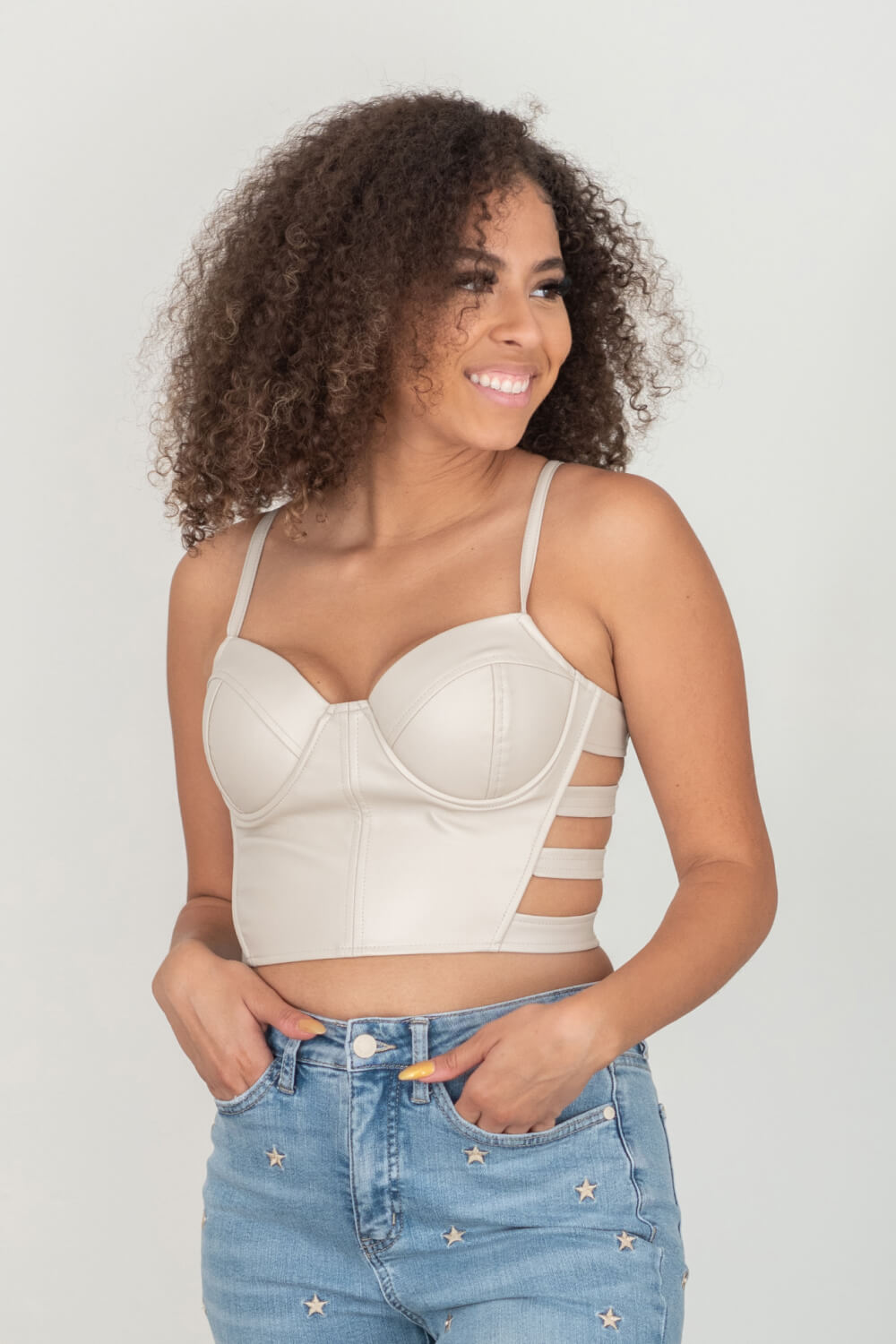 SHOPIRISBASIC Ready to Go Faux Leather Strappy Bustier Crop Top in Oyster -