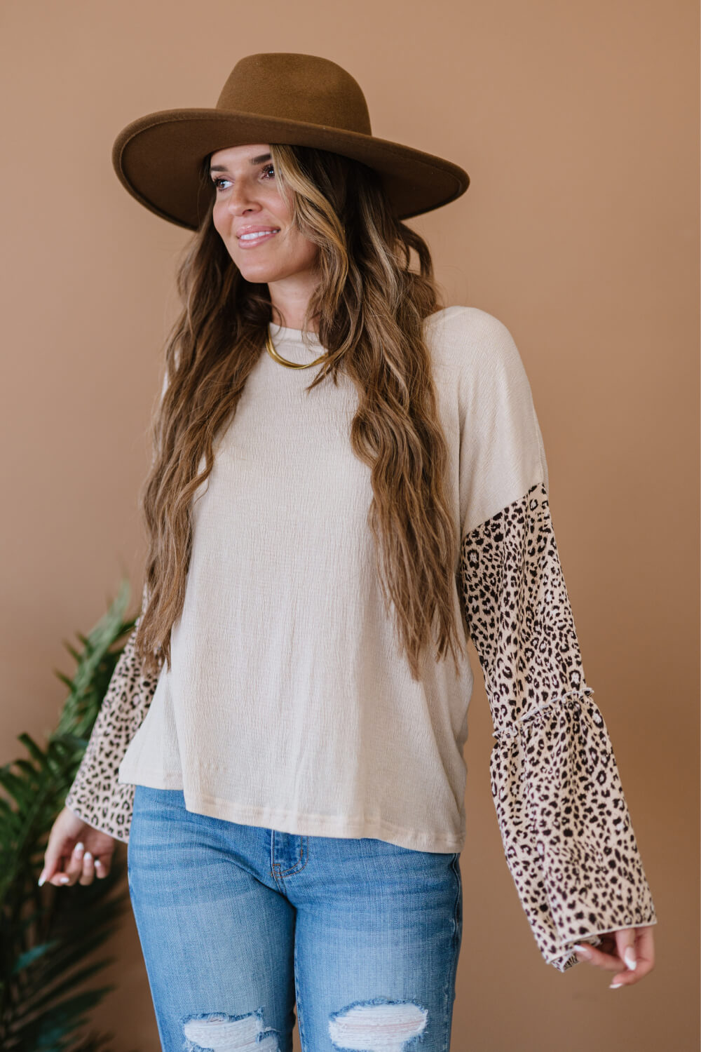 Aspire to Inspire Leopard Bell Sleeve Top -