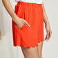 Cotton Bleu Ups and Downs Scalloped Airflow Shorts in Hot Coral -