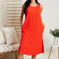 Cotton Bleu Fingers Crossed Sleeveless Dress in Orange -