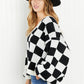 Davi & Dani Reality Check Full Size Checkered V-Neck Sweater -