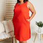Cotton Bleu Fingers Crossed Sleeveless Dress in Orange -