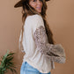 Aspire to Inspire Leopard Bell Sleeve Top -