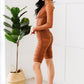 PRIVY Ruched Deep V Romper -
