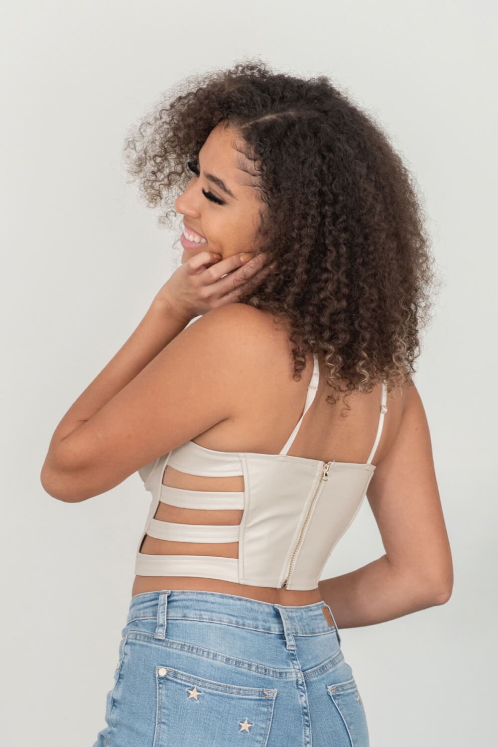 SHOPIRISBASIC Ready to Go Faux Leather Strappy Bustier Crop Top in Oyster -